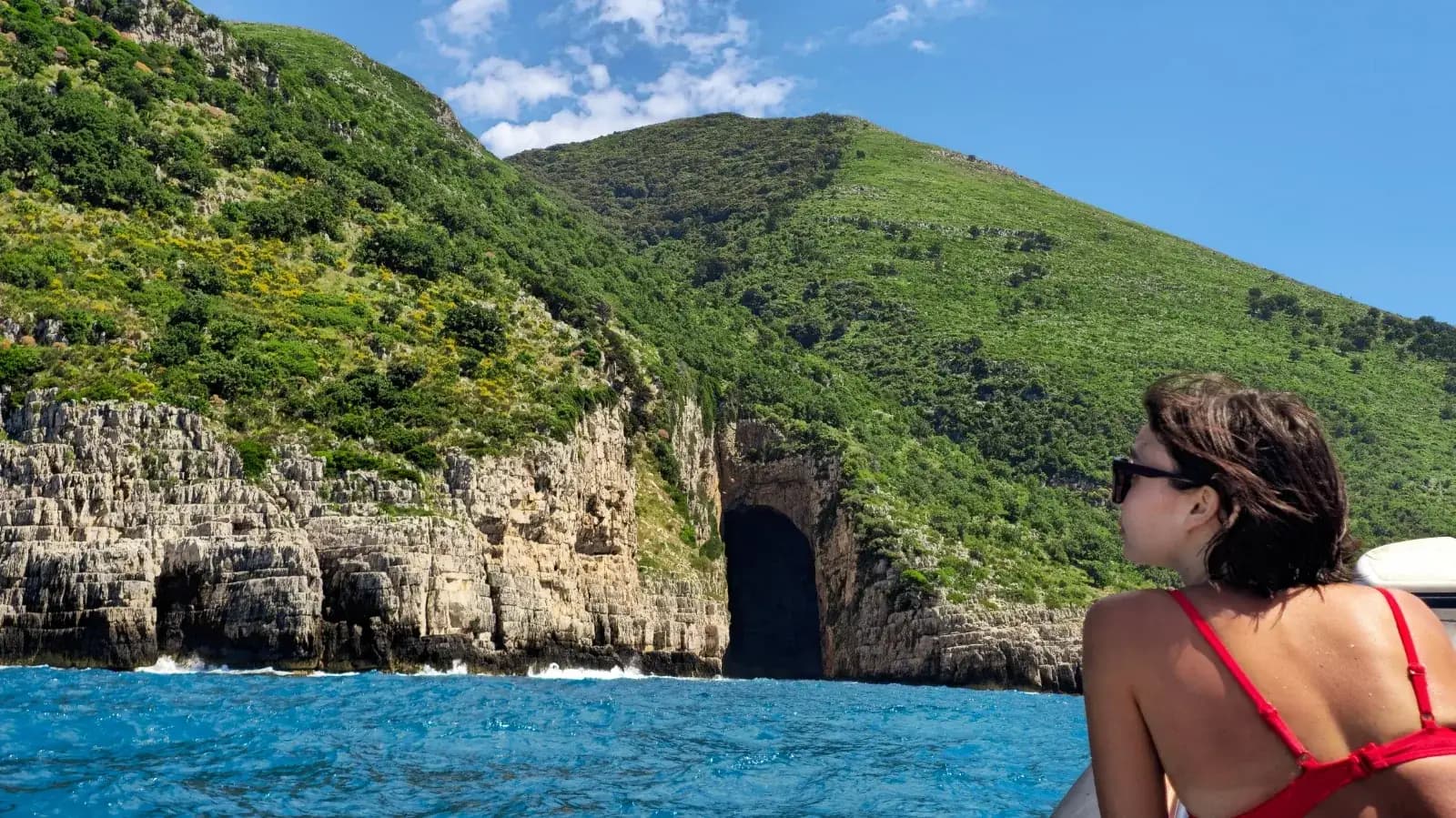 Speed boat exploring sea caves